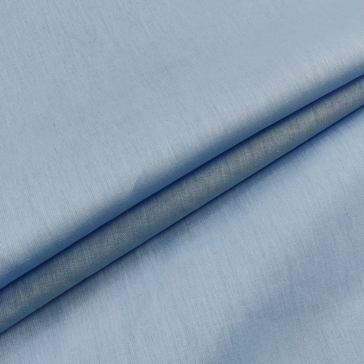 tessuto-cotone-lenzuolo-azzurro