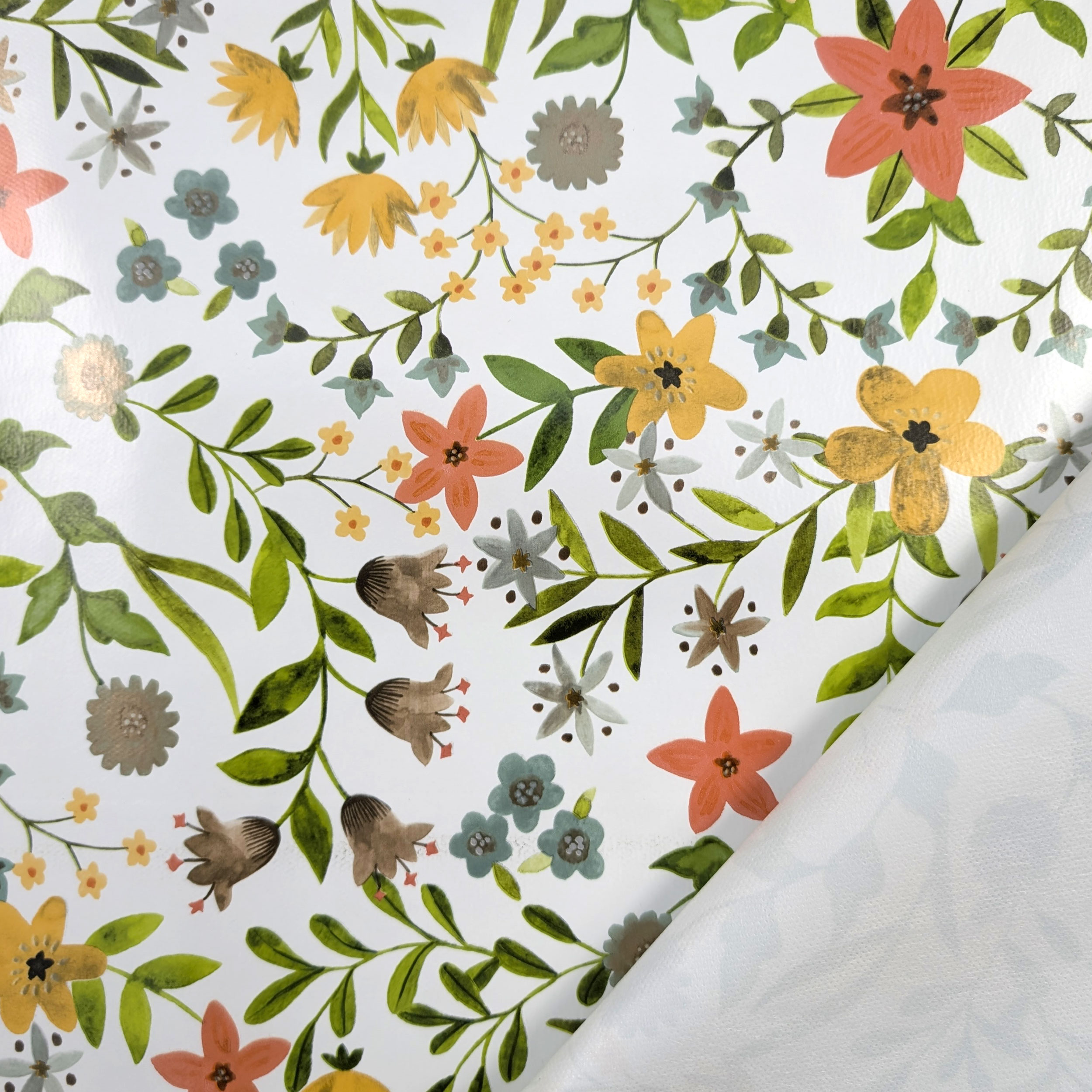 Tessuto per Tovaglia Plastificata Fiori Toni Caldi Image