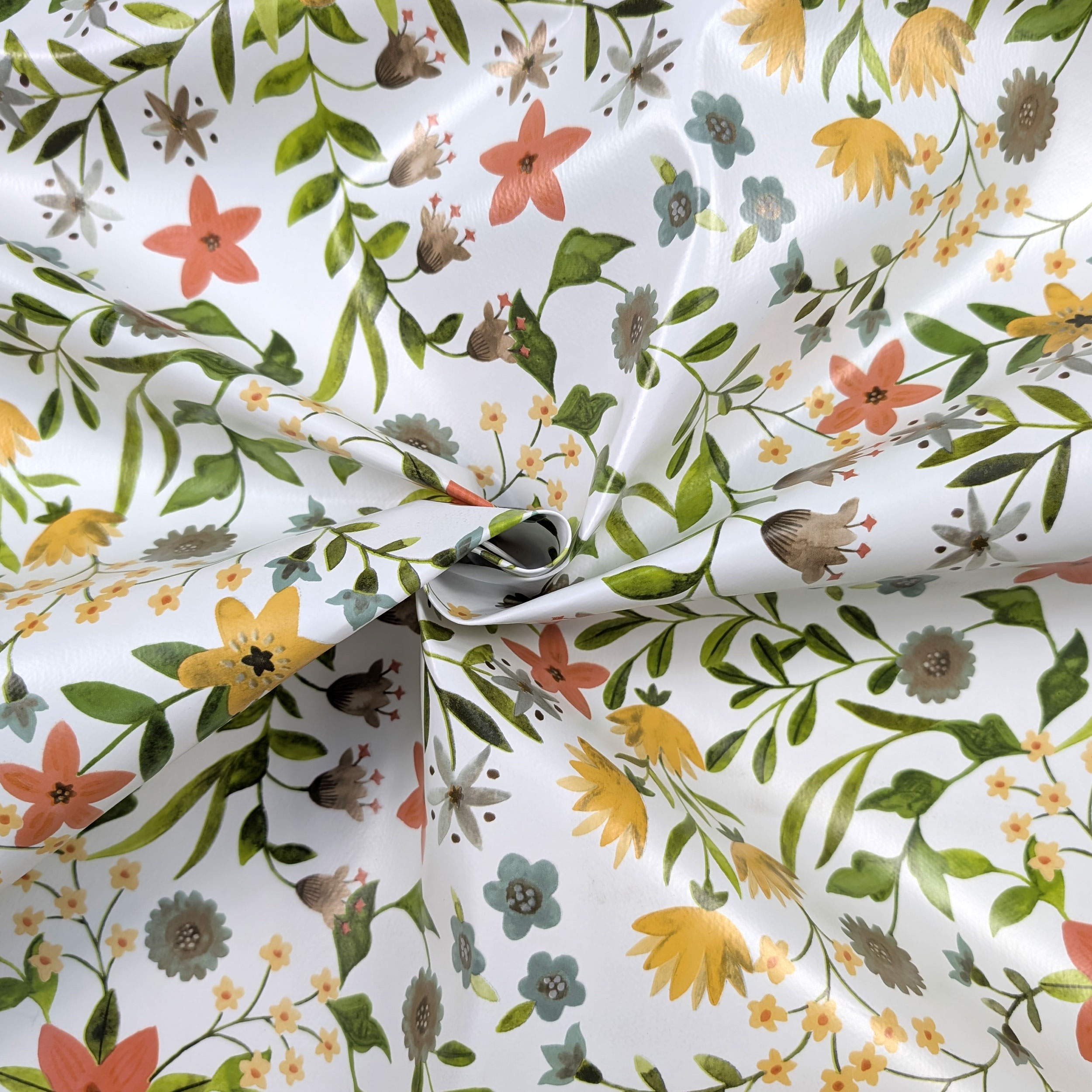Tessuto per Tovaglia Plastificata Fiori Toni Caldi Image