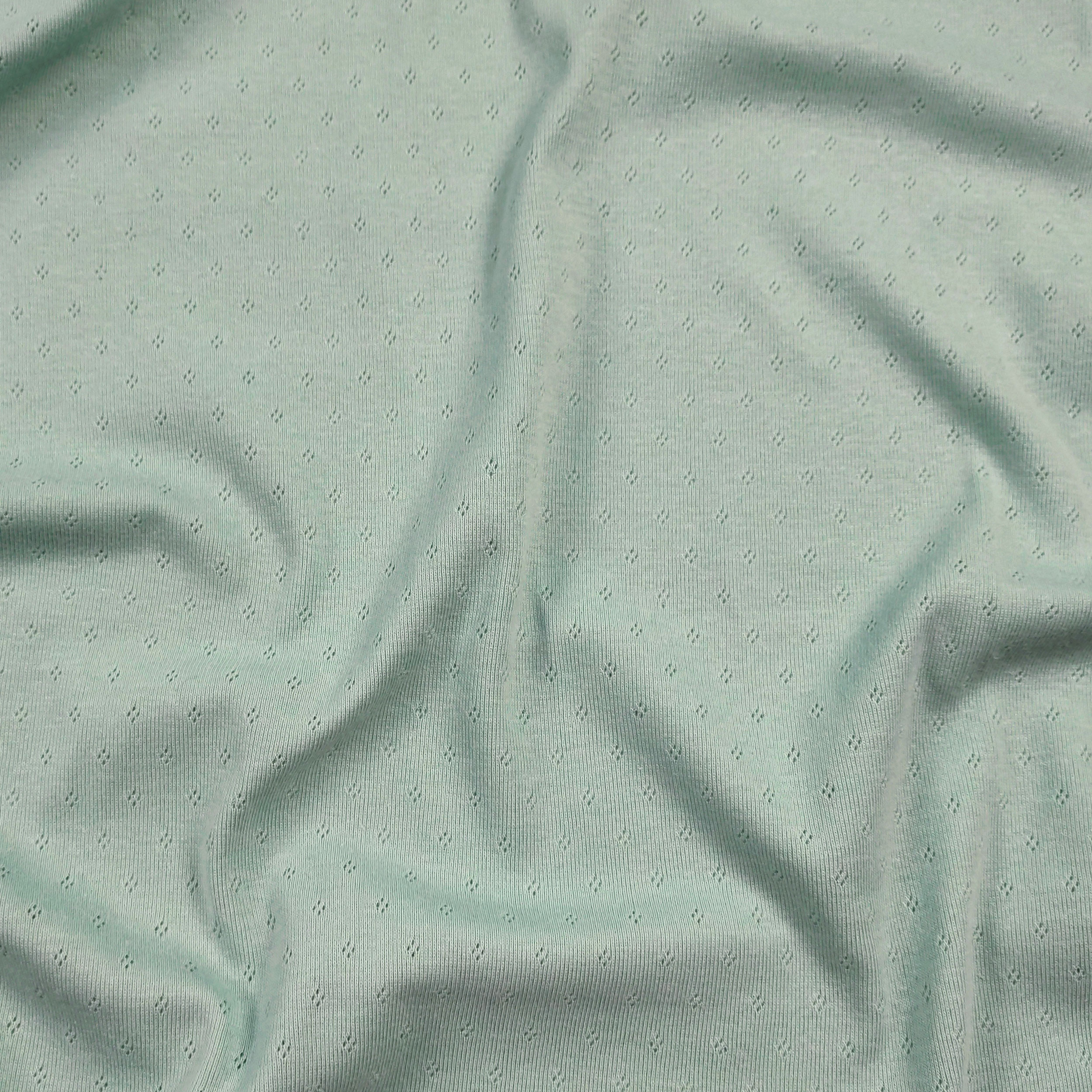 Jersey Cotone Fiori Traforati su Sfondo Menta