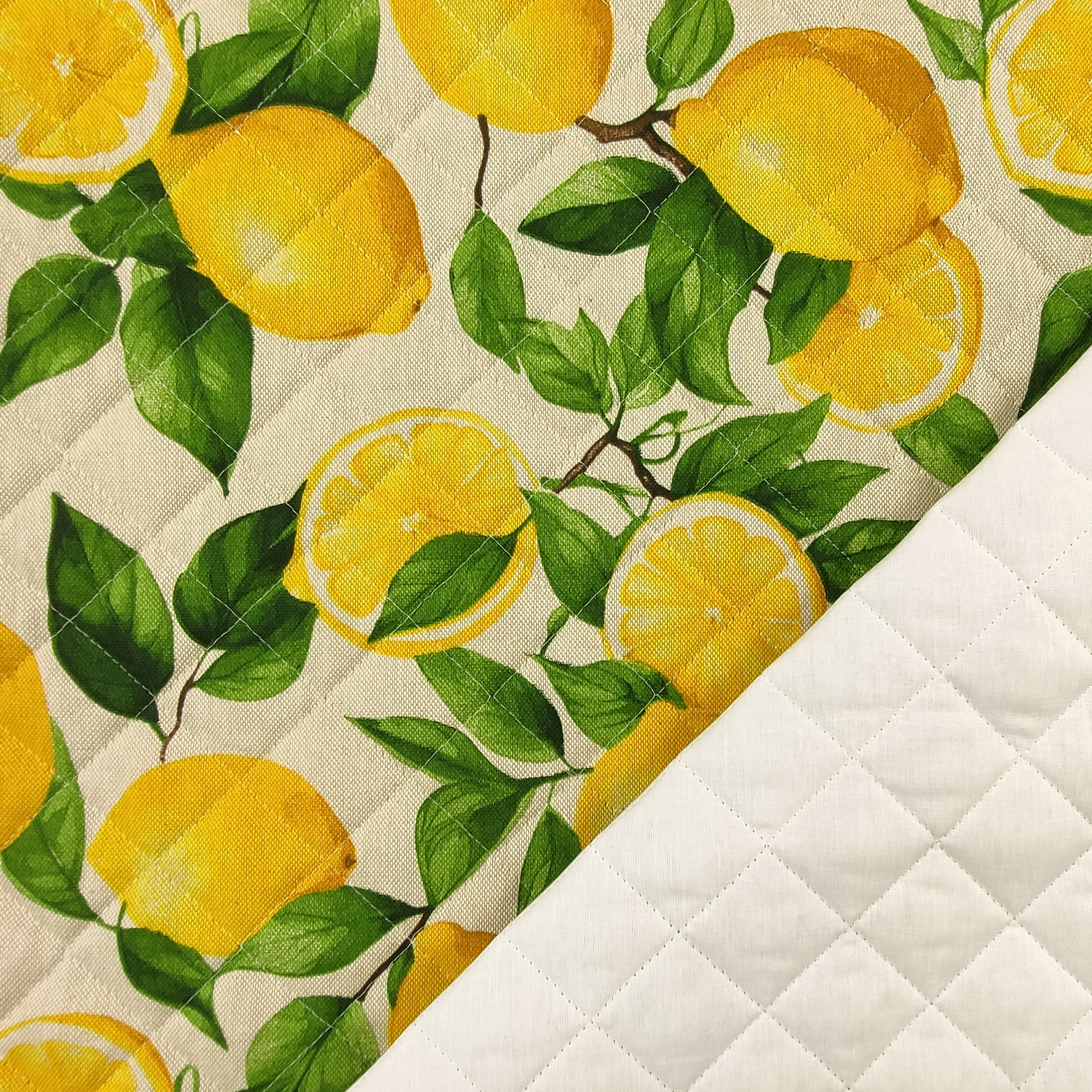 Tessuto Trapuntato Limoni Sfondo Beige Image