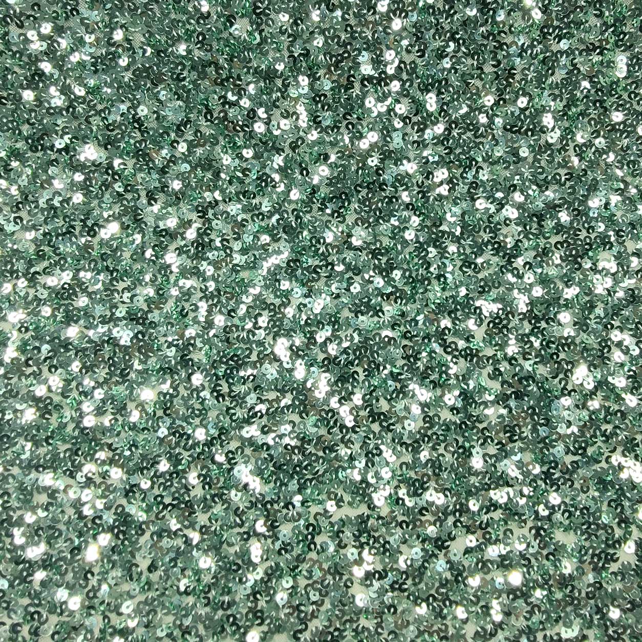 Tessuto Paillettes su Tulle Verde Menta