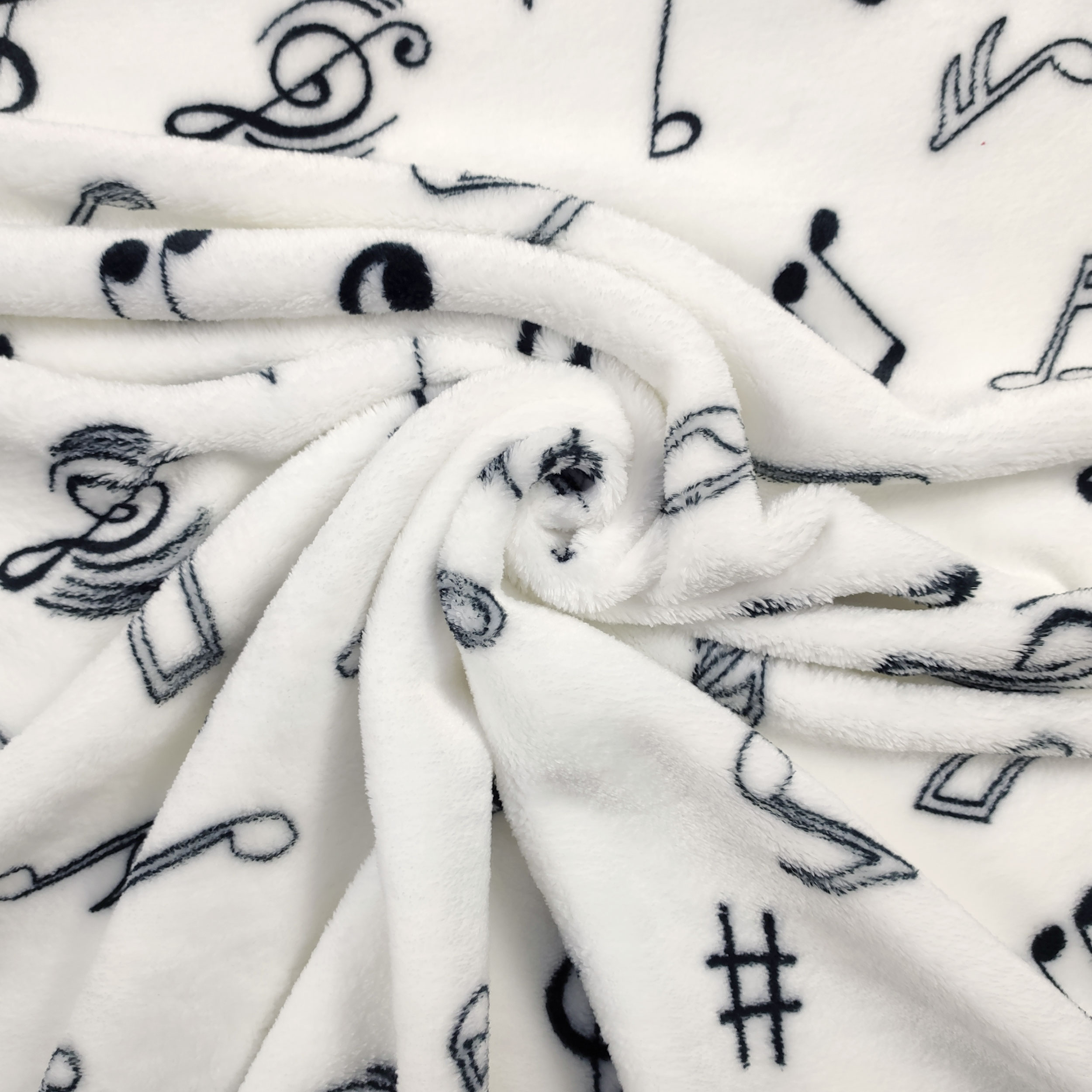 Pile Mano Cachemire Bianco con Note Musicali